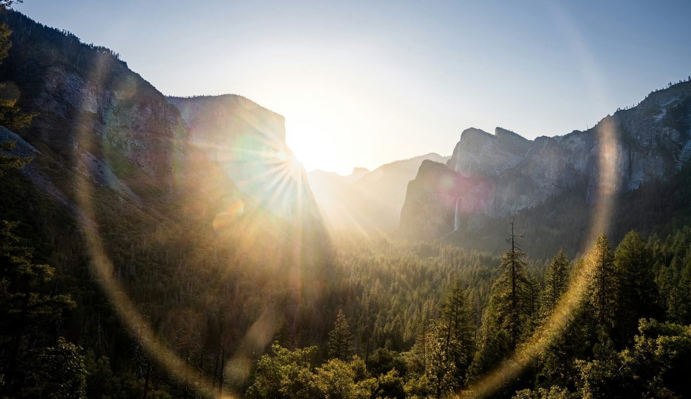 Wide mountain valley view at sunrise